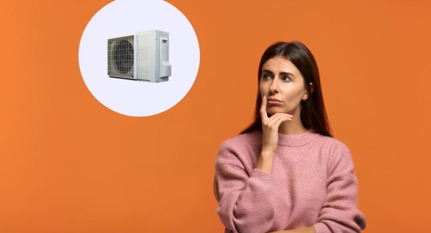 Photo of woman pondering, left of woman image of a heat pump in a white circle, making it look almost like a thought bubble